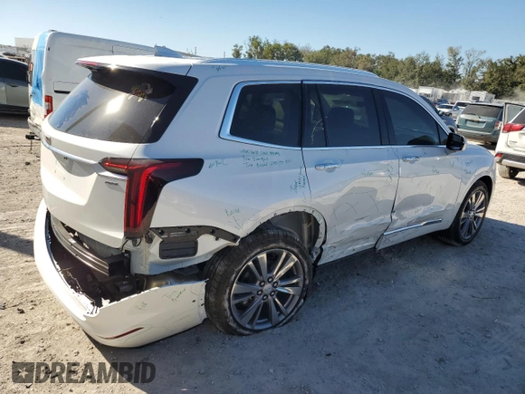 2024 Cadillac XT6 FWD Premium Luxury with VIN 1GYKPCRS4RZ742995, listed as a Copart auction lot 82802774 with 5,898 mi miles and Salvage Title. Bid and sale history available at carsss.com. Image 3.