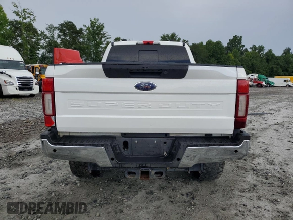 2021 Ford F-250 XL with VIN 1FT8W2BTXMEC41464, listed as a Copart auction lot 61588905 with 131,973 mi miles and Salvage title. Bid and sale history available at DreamBid. Image 6.