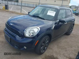 2014 MINI Countryman S with VIN WMWZC3C54EWP26131, listed as a IAAI auction lot 42012162 with 125,869 mi miles and . Bid and sale history available at DreamBid. Image 2.