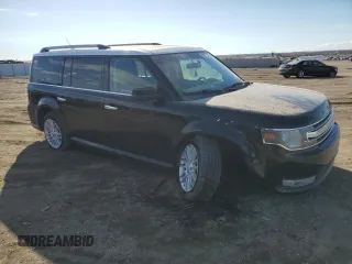 2015 Ford Flex SEL with VIN 2FMHK6C85FBA21138, listed as a Copart auction lot 50011725 with 115,897 mi miles and Salvage Title. Bid and sale history available at carsss.com. Image 4.