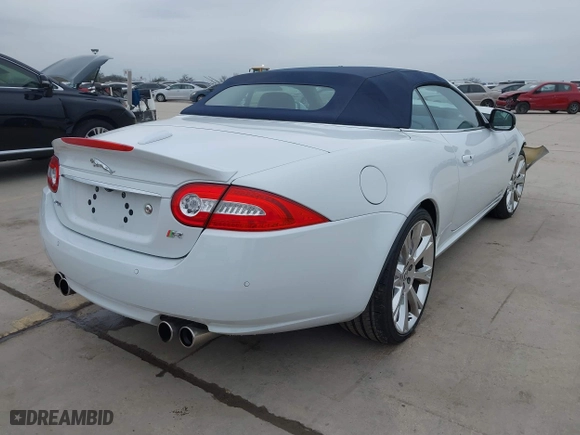 2014 Jaguar XK with VIN SAJWA4EC9EMB52042, listed as a IAAI auction lot 41635233 with 10,566 mi miles. Bid and sale history available at carsss.com. Image 4.