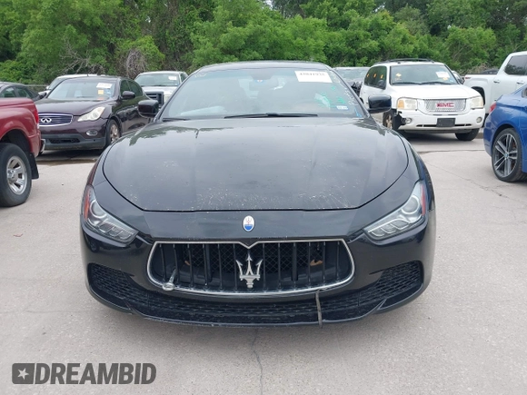 2016 Maserati Ghibli S Q4 with VIN ZAM57RTA3G1178723, listed as a IAAI auction lot 42041935 with 129,647 mi miles and . Bid and sale history available at DreamBid. Image 12.