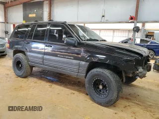 1996 Jeep Grand Cherokee Laredo with VIN 1J4GZ58S9TC370707, listed as a Copart auction lot 89285205 with 278,457 mi miles and Salvage Title. Bid and sale history available at carsss.com. Image 4.