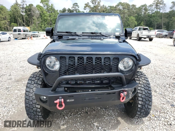 2023 Jeep Gladiator Sport S with VIN 1C6HJTAG9PL525183, listed as a Copart auction lot 54556735 with 13,805 mi miles and Salvage title. Bid and sale history available at DreamBid. Image 5.