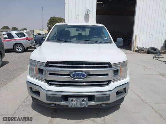 2018 Ford F-150 XL with VIN 1FTEW1EG0JKF15604, listed as a IAAI auction lot 41937885 with 141,864 mi miles. Bid and sale history available at carsss.com. Image 12.