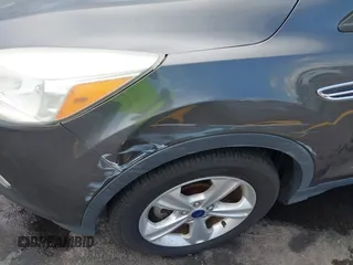 2015 Ford Escape SE with VIN 1FMCU0G75FUC20011, listed as a IAAI auction lot 42113751 with 182,516 mi miles. Bid and sale history available at carsss.com. Image 12.