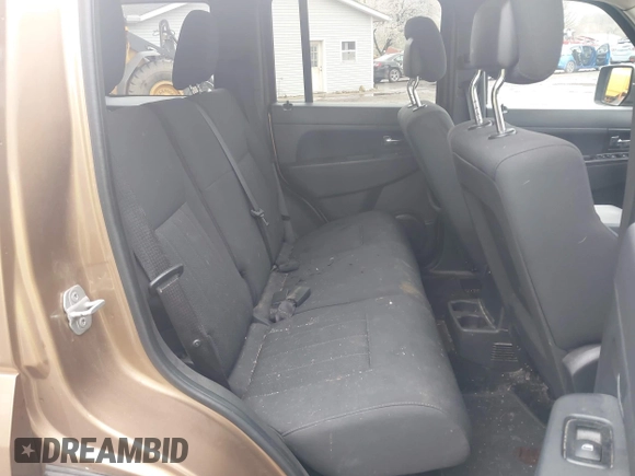 2012 Jeep Liberty Sport with VIN 1C4PJMAKXCW151464, listed as a IAAI auction lot 42015942 with 72,108 mi miles. Bid and sale history available at carsss.com. Image 8.