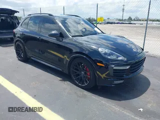 2016 Porsche Cayenne GTS z VIN WP1AD2A25GLA70430, wystawiony jako IAAI lot #42547008 z przebiegiem 108 374 mil mil oraz . Historia ofert i sprzedaży dostępna na DreamBid. Obrazek 1.