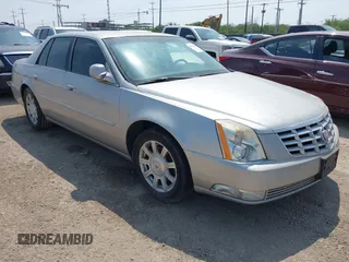 2008 Cadillac DTS 1SA z VIN 1G6KD57Y38U161178, wystawiony jako IAAI lot #42333039 z przebiegiem 116 469 mil mil oraz . Historia ofert i sprzedaży dostępna na DreamBid. Obrazek 1.