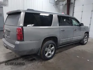 2018 Chevrolet Suburban Premier z VIN 1GNSKJKC9JR100134, wystawiony jako IAAI lot #41449255 z przebiegiem 111 528 mil mil oraz . Historia ofert i sprzedaży dostępna na DreamBid. Obrazek 4.