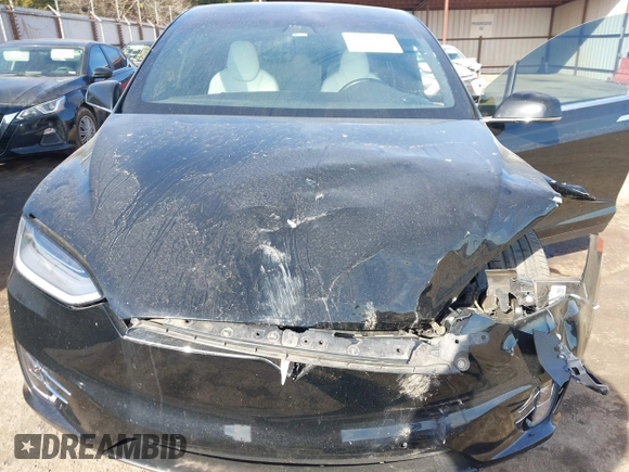 2018 Tesla Model X 75D with VIN 5YJXCDE44JF091690, listed as a IAAI auction lot 41585617 with 128,826 mi miles and . Bid and sale history available at DreamBid. Image 10.