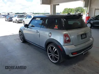 2008 MINI Hardtop S with VIN WMWMF73548TV35548, listed as a IAAI auction lot 42521348 with 104,427 mi miles and . Bid and sale history available at DreamBid. Image 3.