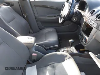 2005 Suzuki Reno z VIN KL5JJ66Z95K107110, wystawiony jako IAAI lot #41804157 z przebiegiem Nie podano mil oraz . Historia ofert i sprzedaży dostępna na DreamBid. Obrazek 5.