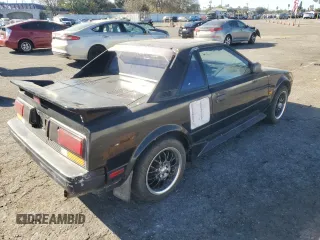1986 Toyota MR2 z VIN JT2AW15C8G0053673, wystawiony jako Copart lot #88160225 z przebiegiem 165 867 mil mil oraz Szkody całkowita. Historia ofert i sprzedaży dostępna na DreamBid. Obrazek 3.