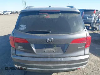 2017 Honda Pilot Touring with VIN 5FNYF5H97HB023919, listed as a IAAI auction lot 41864959 with 70,360 mi miles. Bid and sale history available at carsss.com. Image 16.