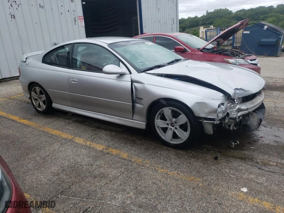 2004 Pontiac GTO with VIN 6G2VX12G84L280263, listed as a Copart auction lot 66575924 with 112,302 mi miles and Salvage Title. Bid and sale history available at carsss.com. Image 4.