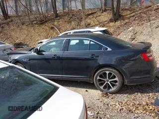 2014 Ford Taurus SHO with VIN 1FAHP2KT8EG131067, listed as a IAAI auction lot 42102086 with 107,822 mi miles. Bid and sale history available at carsss.com. Image 14.