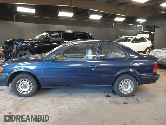 1996 Toyota Tercel DX z VIN JT2AC52L9T0139217, wystawiony jako IAAI lot #41898808 z przebiegiem 86 500 mil mil oraz . Historia ofert i sprzedaży dostępna na DreamBid. Obrazek 14.