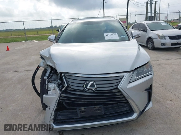 2016 Lexus RX 350 with VIN 2T2ZZMCA4GC013614, listed as a IAAI auction lot 42112946 with 92,880 mi miles and . Bid and sale history available at DreamBid. Image 12.