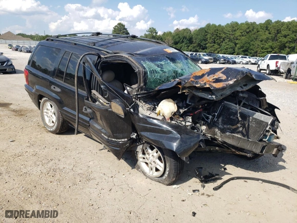 2004 Jeep Grand Cherokee Laredo with VIN 1J4GX48N64C362415, listed as a Copart auction lot 68836614 with 0 mi miles and Salvage Title. Bid and sale history available at carsss.com. Image 4.