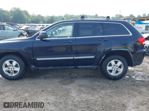2011 Jeep Grand Cherokee Laredo with VIN 1J4RR4GG5BC622628, listed as a IAAI auction lot 42402893 with 163,731 mi miles and . Bid and sale history available at DreamBid. Image 15.
