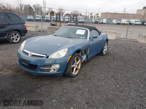 2008 Saturn Sky with VIN 1G8MB35B78Y100109, listed as a IAAI auction lot 41747341 with 128,516 mi miles. Bid and sale history available at carsss.com. Image 2.