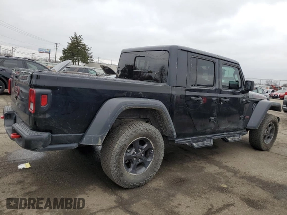 2023 Jeep Gladiator Rubicon with VIN 1C6JJTBG6PL500516, listed as a Copart auction lot 43432015 with 107,096 mi miles and Salvage title. Bid and sale history available at DreamBid. Image 3.