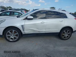 2012 Cadillac SRX Performance Collection with VIN 3GYFNEE33CS528697, listed as a IAAI auction lot 41374060 with 157,319 mi miles and . Bid and sale history available at DreamBid. Image 6.