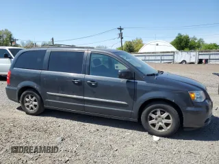 2012 Chrysler Town & Country Touring with VIN 2C4RC1BG9CR135731, listed as a Copart auction lot 55017145 with 143,855 mi miles and Clean Title. Bid and sale history available at DreamBid. Image 4.