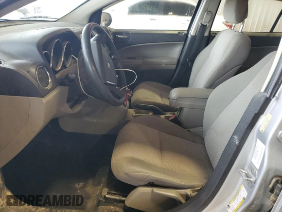 2011 Dodge Caliber Mainstreet z VIN 1B3CB3HAXBD237629, wystawiony jako Copart lot #56727465 z przebiegiem 155 166 mil mil oraz Szkoda całkowita • Salvage title. Historia ofert i sprzedaży dostępna na DreamBid. Obrazek 7.