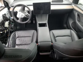 2023 Tesla Model Y Long Range z VIN 7SAYGDEE4PF797653, wystawiony jako Copart lot #58668985 z przebiegiem 35 520 mil mil oraz Szkody całkowita. Historia ofert i sprzedaży dostępna na DreamBid. Obrazek 8.