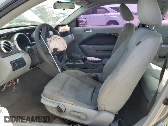 2008 Ford Mustang Deluxe with VIN 1ZVHT80N985139981, listed as a Copart auction lot 62411995 with 235,999 mi miles and Salvage title. Bid and sale history available at DreamBid. Image 7.
