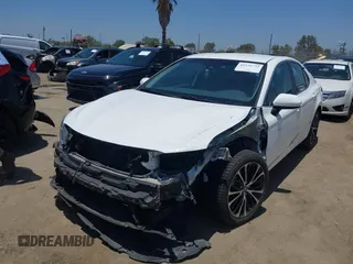 2018 Toyota Camry LE with VIN 4T1B11HK5JU007856, listed as a IAAI auction lot 42531732 with 121,020 mi miles and . Bid and sale history available at DreamBid. Image 2.