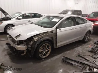 2019 Ford Fusion Hybrid Titanium with VIN 3FA6P0RU9KR105317, listed as a IAAI auction lot 41676108 with 102,265 mi miles. Bid and sale history available at carsss.com. Image 21.