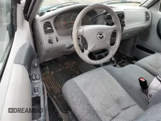 2002 Mazda B-Series 2WD Truck DS with VIN 4F4YR12U22TM18471, listed as a Copart auction lot 80783584 with 83,676 mi miles and Salvage Title. Bid and sale history available at carsss.com. Image 8.