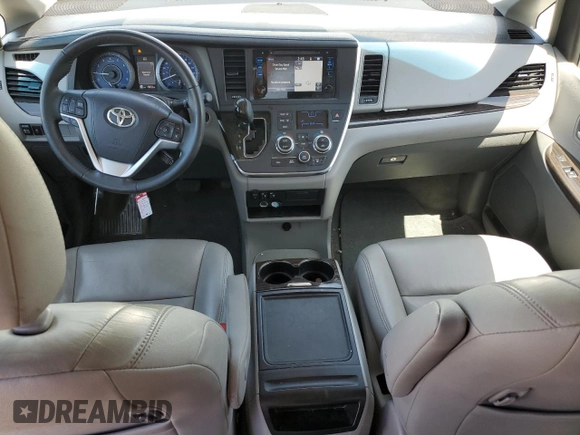 2016 Toyota Sienna XLE с VIN 5TDYK3DC5GS740962, выставлен на аукционе Copart как лот 61189865 с пробегом 75 722 миль миль и Списание • Salvage title. История ставок и продаж доступна на DreamBid. Изображение 8.