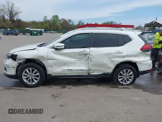 2017 Nissan Rogue S with VIN 5N1AT2MM3HC794051, listed as a IAAI auction lot 42063921 with 129,586 mi miles and . Bid and sale history available at DreamBid. Image 14.