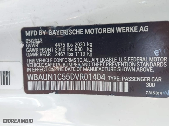 2013 BMW 1 Series 128i with VIN WBAUN1C55DVR01404, listed as a IAAI auction lot 41682695 with 100,948 mi miles. Bid and sale history available at carsss.com. Image 9.