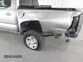 2021 Toyota Tacoma SR with VIN 3TYAX5GN9MT019636, listed as a IAAI auction lot 42497197 with 48,041 mi miles and . Bid and sale history available at DreamBid. Image 6.