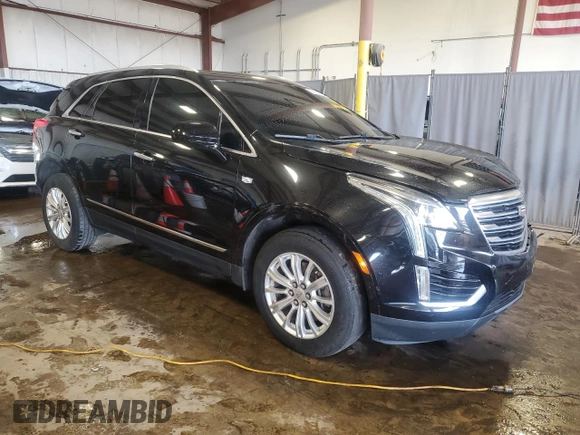2017 Cadillac XT5 FWD with VIN 1GYKNARS0HZ257035, listed as a Copart auction lot 64284525 with 102,605 mi miles and Salvage title. Bid and sale history available at DreamBid. Image 4.
