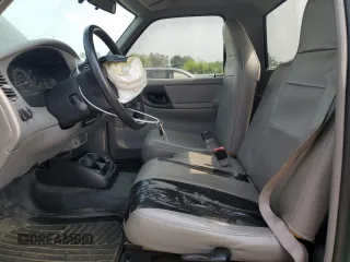 2000 Ford Ranger XLT with VIN 1FTYR10X8YTA65040, listed as a Copart auction lot 59956065 with 112,532 mi miles and Salvage title. Bid and sale history available at DreamBid. Image 7.