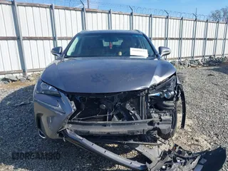 2016 Lexus NX 200t with VIN JTJYARBZ9G2036927, listed as a IAAI auction lot 41609837 with 215,448 mi miles. Bid and sale history available at carsss.com. Image 12.