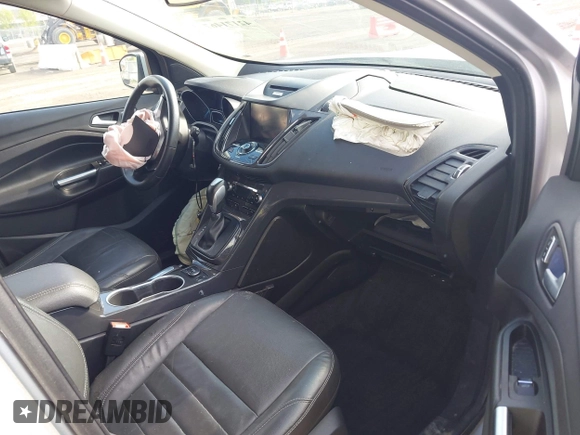 2015 Ford Escape Titanium z VIN 1FMCU9J99FUC75852, wystawiony jako IAAI lot #42171467 z przebiegiem 113 322 mil mil oraz . Historia ofert i sprzedaży dostępna na DreamBid. Obrazek 5.