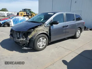 2014 Honda Odyssey LX with VIN 5FNRL5H29EB101385, listed as a Copart auction lot 53571095 with 137,067 mi miles and Salvage Title. Bid and sale history available at carsss.com. Image 1.
