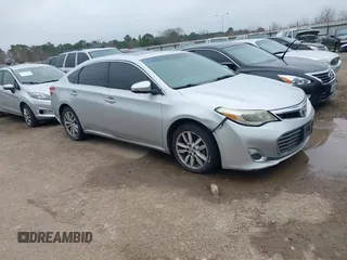 2013 Toyota Avalon XLE with VIN 4T1BK1EB4DU053880, listed as a IAAI auction lot 41605330 with 266,336 mi miles and . Bid and sale history available at DreamBid. Image 1.