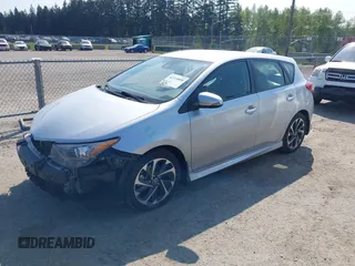 2018 Toyota Corolla iM with VIN JTNKARJE0JJ576022, listed as a IAAI auction lot 42114808 with 146,894 mi miles. Bid and sale history available at carsss.com. Image 2.
