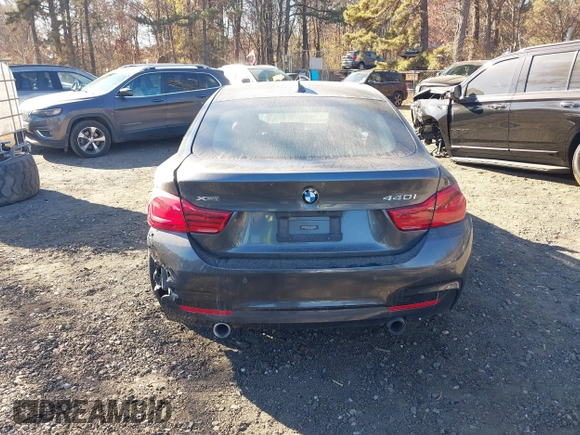 2019 BMW 4 Series 440i xDrive with VIN WBA4J7C52KBM75345, listed as a IAAI auction lot 40613703 with 31,402 mi miles and . Bid and sale history available at carsss.com. Image 16.