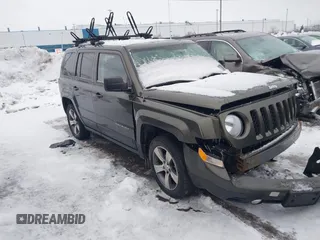 2016 Jeep Patriot High Altitude Edition with VIN 1C4NJRFB6GD523428, listed as a IAAI auction lot 41499025 with 116,789 mi miles. Bid and sale history available at carsss.com. Image 1.
