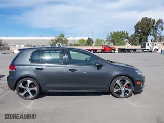 2013 Volkswagen GTI with VIN WVWHD7AJ2DW132851, listed as a IAAI auction lot 42021650 with 83,473 mi miles. Bid and sale history available at carsss.com. Image 13.