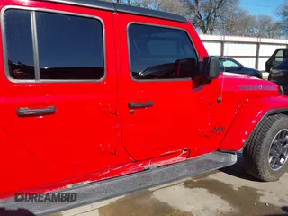 2021 Jeep Gladiator Freedom z VIN 1C6HJTAG7ML609661, wystawiony jako IAAI lot #41410756 z przebiegiem 44 636 mil mil oraz . Historia ofert i sprzedaży dostępna na DreamBid. Obrazek 18.